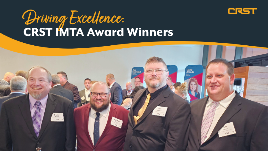 A group of five CRST employees dressed in formal attire stand together at the Iowa Motor Truck Association Awards ceremony. Smiling and wearing name badges, they celebrate their recognition for excellence in the trucking industry. The event backdrop features banners and attendees in a professional setting.