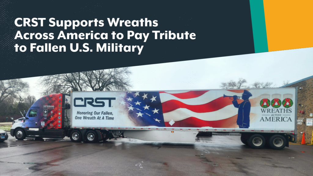 A CRST truck and trailer wrapped in a patriotic Wreaths Across America design, featuring an American flag, a bugler silhouette, and the message "Honoring Our Fallen, One Wreath at a Time," parked on a wet pavement with trees in the background