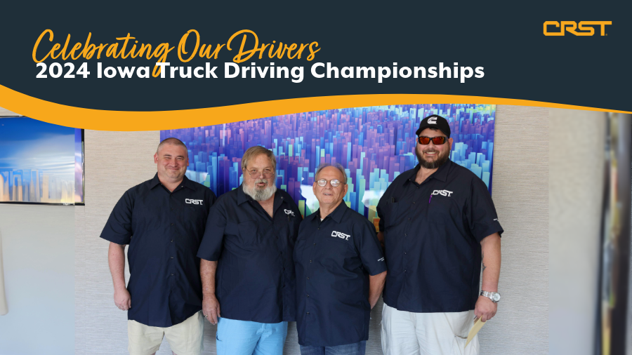 Four CRST men drivers with navy blue CRST shirts